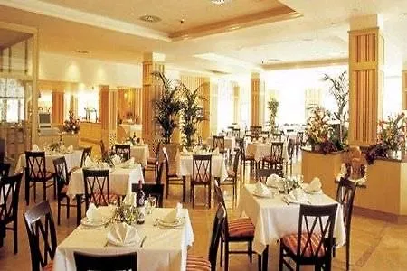 Grupotel Macarella & מלון דירות סון קסוריגואה